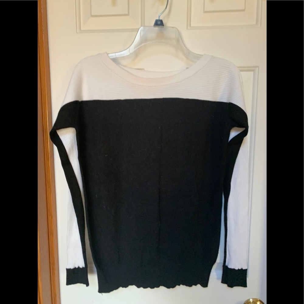 Light weight black knit sweater with white accent